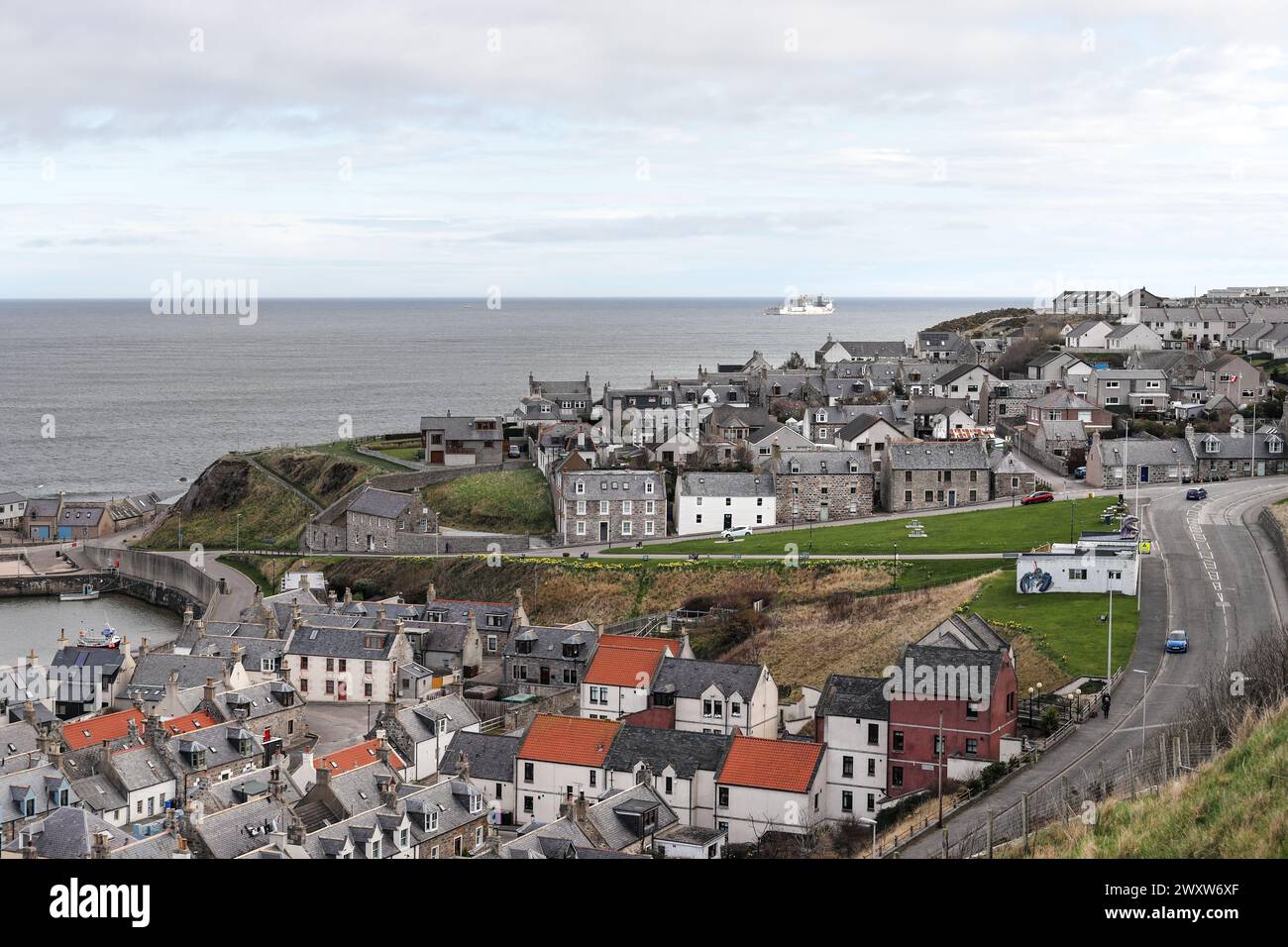 The view over the rooftops in the coastal village of Cullen in Spring, Moray, Scotland, UK Stock Photo