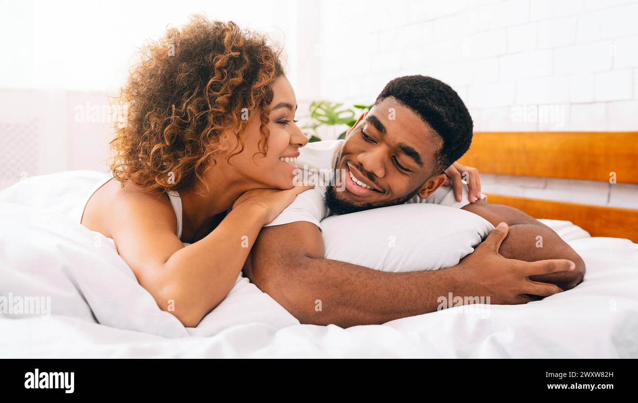 Loving young black woman hi-res stock photography and images - Alamy