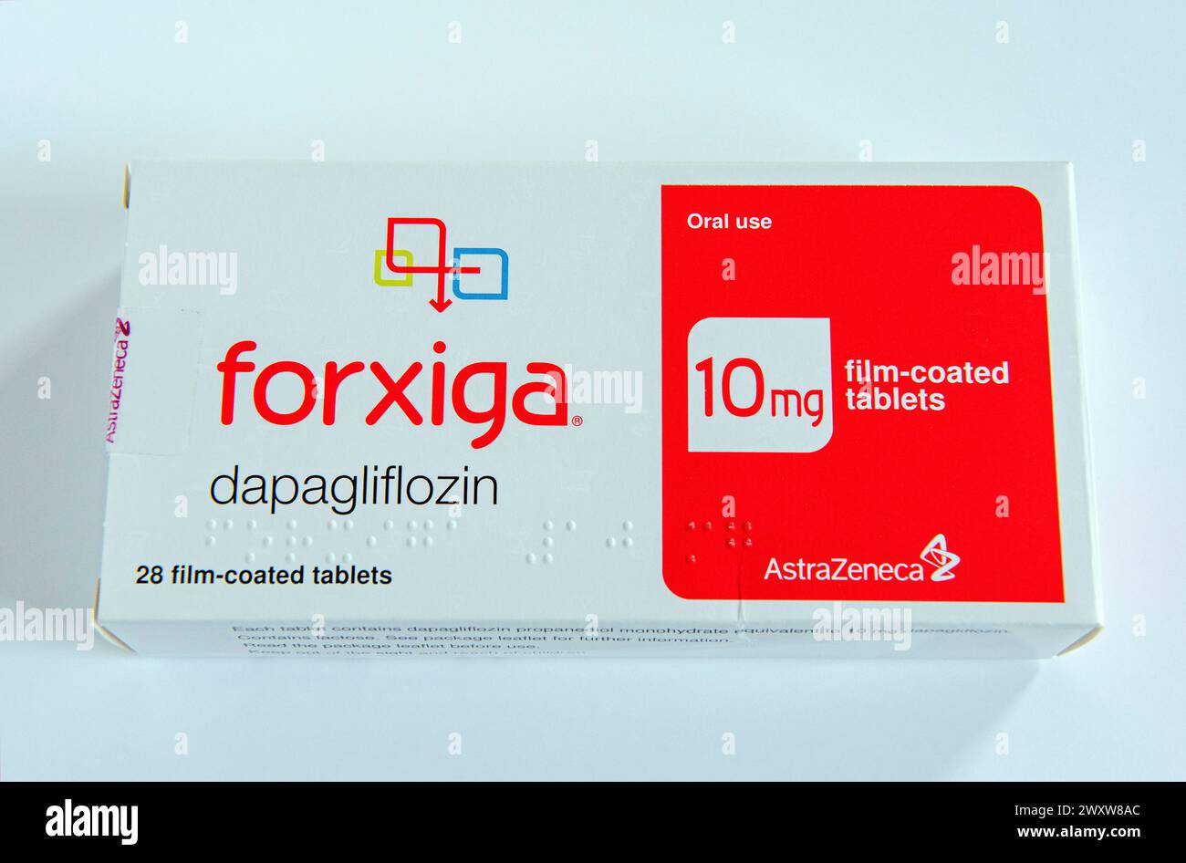 Packet of 28 Dapagliflozin 10mg film-coated tablets on white background ...