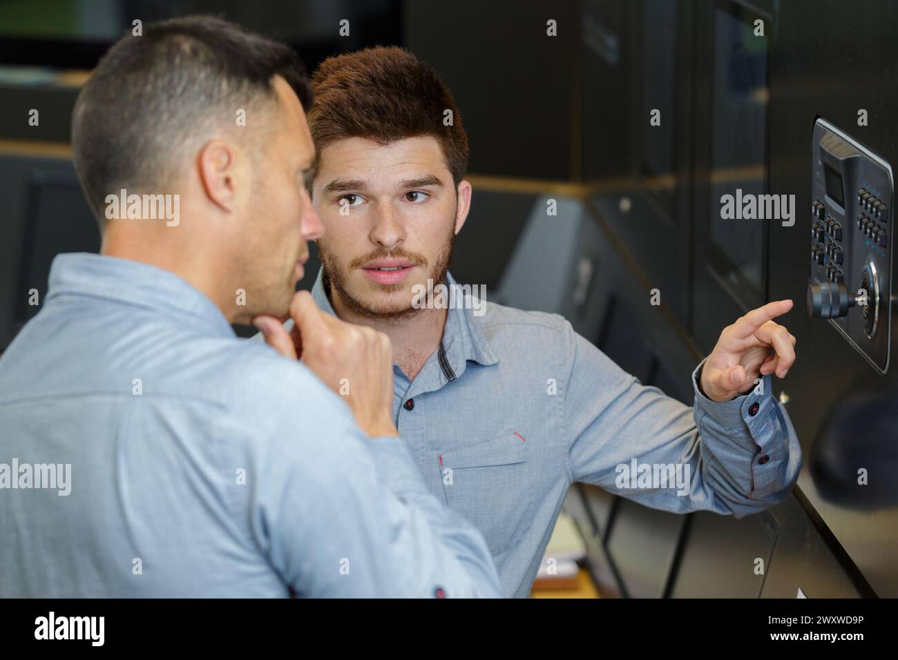 workers and cyber security network concept Stock Photo