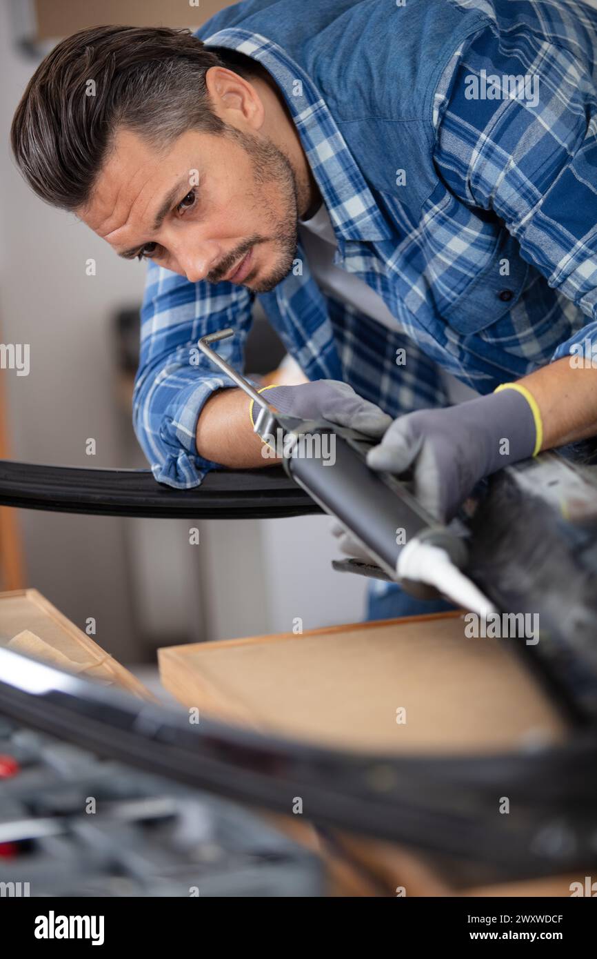 worker repairing a car body Stock Photo