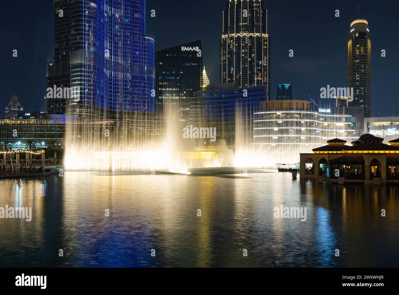 A picture of the Dubai Fountain light and water show at night Stock ...