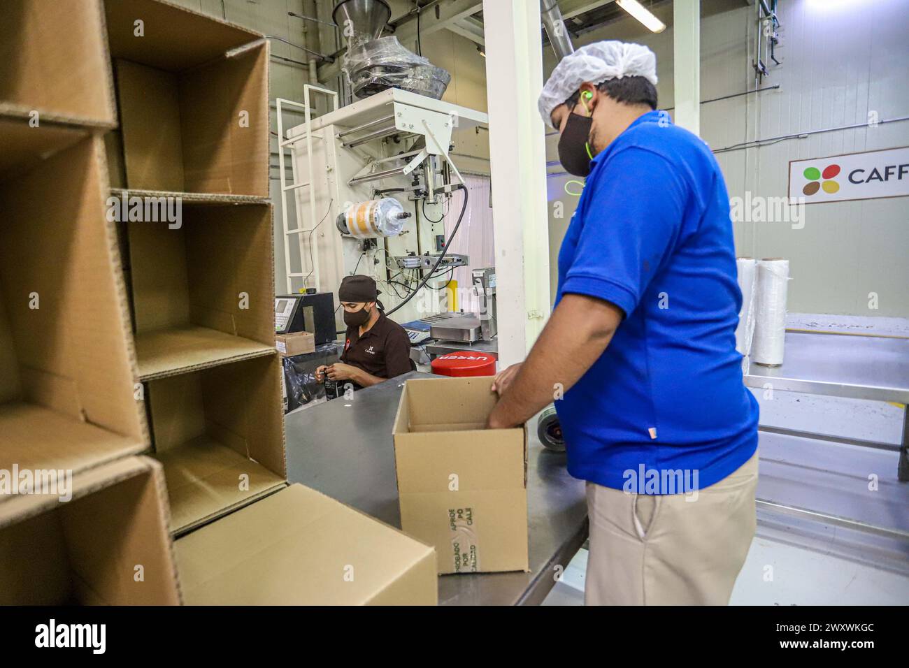 coffee manufacturing plant, industrialized roasted coffee production process, ground coffee