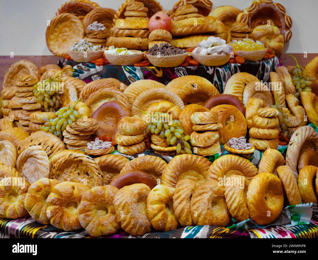 Uzbek flatbreads with a beautiful pattern in a wicker basket on a