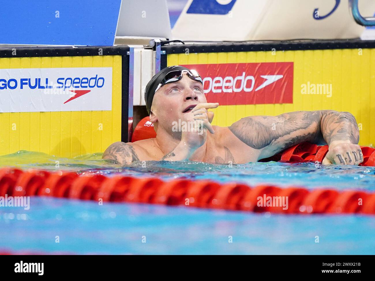 Adam Peaty reacts after winning the Men's 100 Breaststroke Final during ...