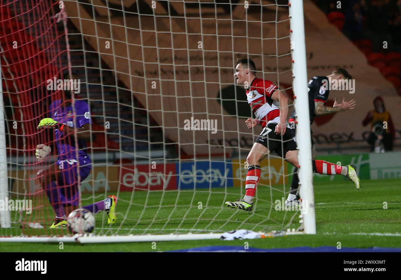 Doncaster Rovers's Owen Bailey scores during the Sky Bet League 2 match between Doncaster Rovers and Wrexham at the Keepmoat Stadium, Doncaster on Tuesday 2nd April 2024. (Photo: Michael Driver | MI News) Credit: MI News & Sport /Alamy Live News Stock Photo