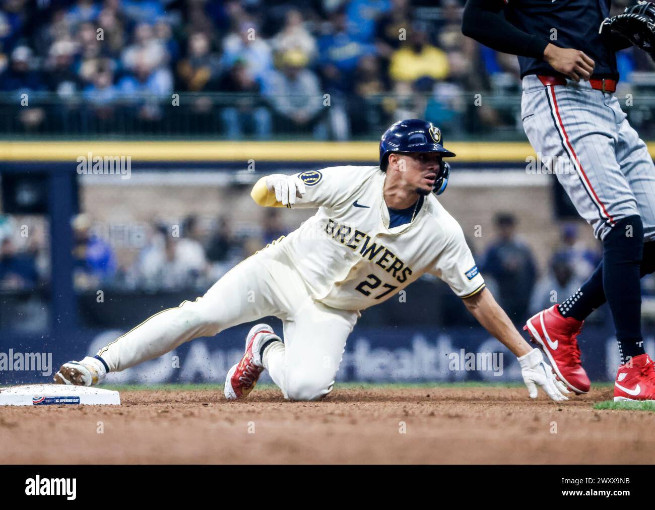 Milwaukee Brewers Shortstop Willy Adames Slides Into Second Base As He ...