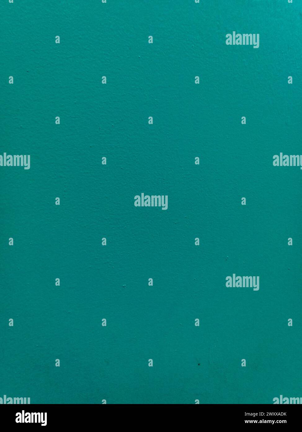 Blurred green stucco wall background  painted cement wall texture Stock Photo