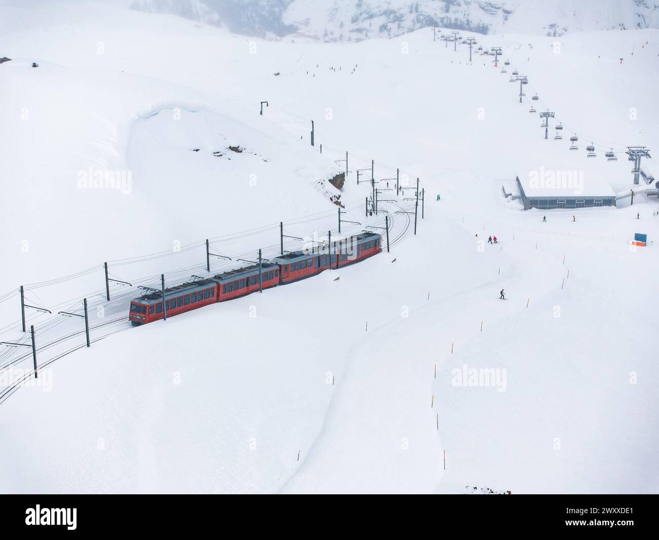 Aerial View of Red Train and Skiers at Zermatt Ski Resort, Switzerland ...