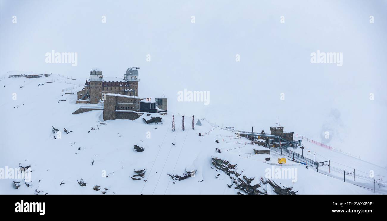 Aerial View of Snowy Zermatt Ski Resort with Mountain Lodge and Ski ...