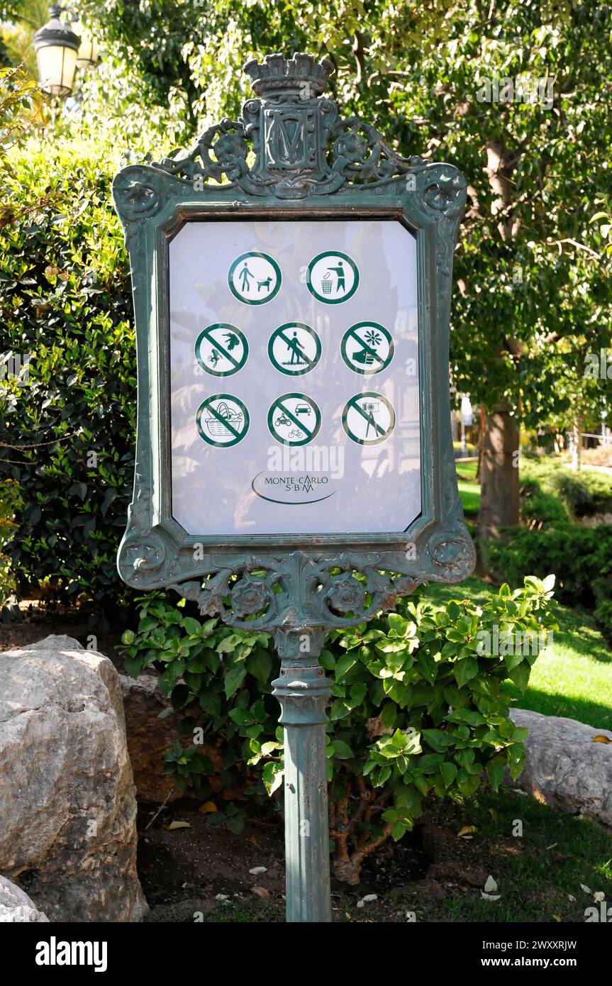 Information board with environmental protection symbols in a metal frame, Monte Carlo, Principality of Monaco, Monaco Stock Photo