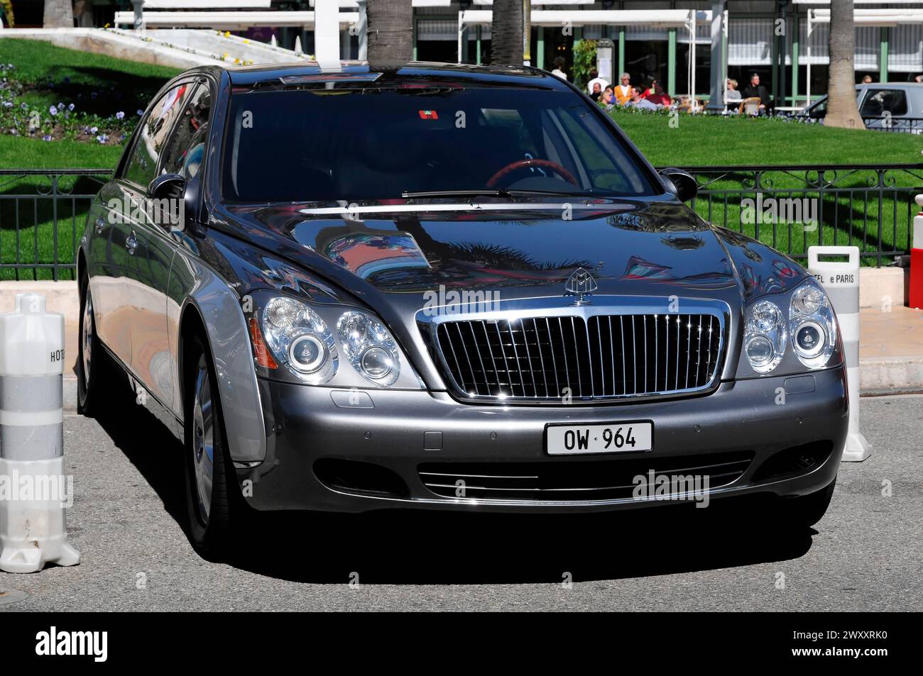 Luxury car Maybach at the casino, Monte Carlo, A gleaming luxury limousine drives along a busy city street, Monte Carlo, Principality of Monaco Stock Photo
