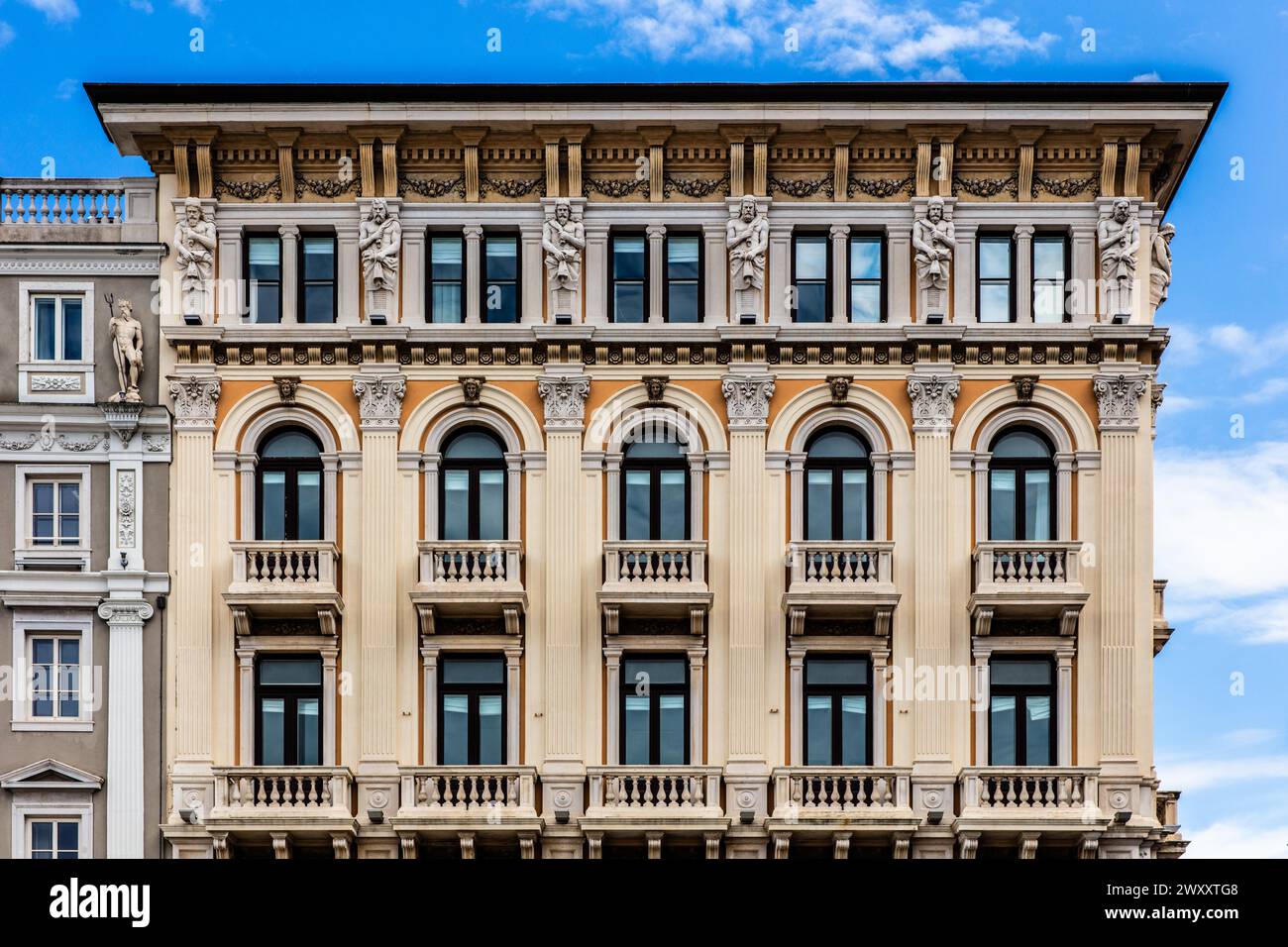 Palazzo Modello, by Giuseppe Bruni, 1873, electic historicism, Piazza Unita d'Italia in the heart of the city, is surrounded on three sides by Stock Photo