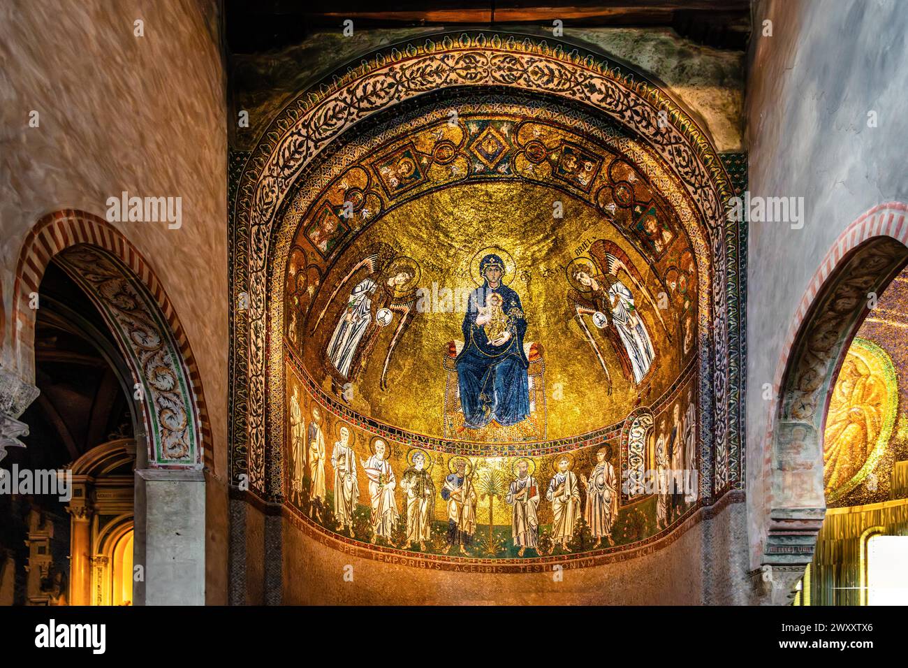 Our Lady between the Archangels Gabriel and Michael and the Apostles, 11th century, Byzantine mosaic, left Abssis, Cathedral of San Giusto, Colle di Stock Photo