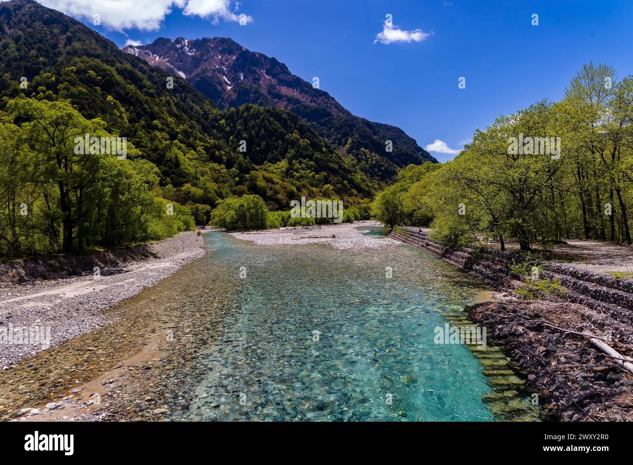 Clear, cold river running through a forested valley. River Azusa, Kamikochi, Japan Stock Photo