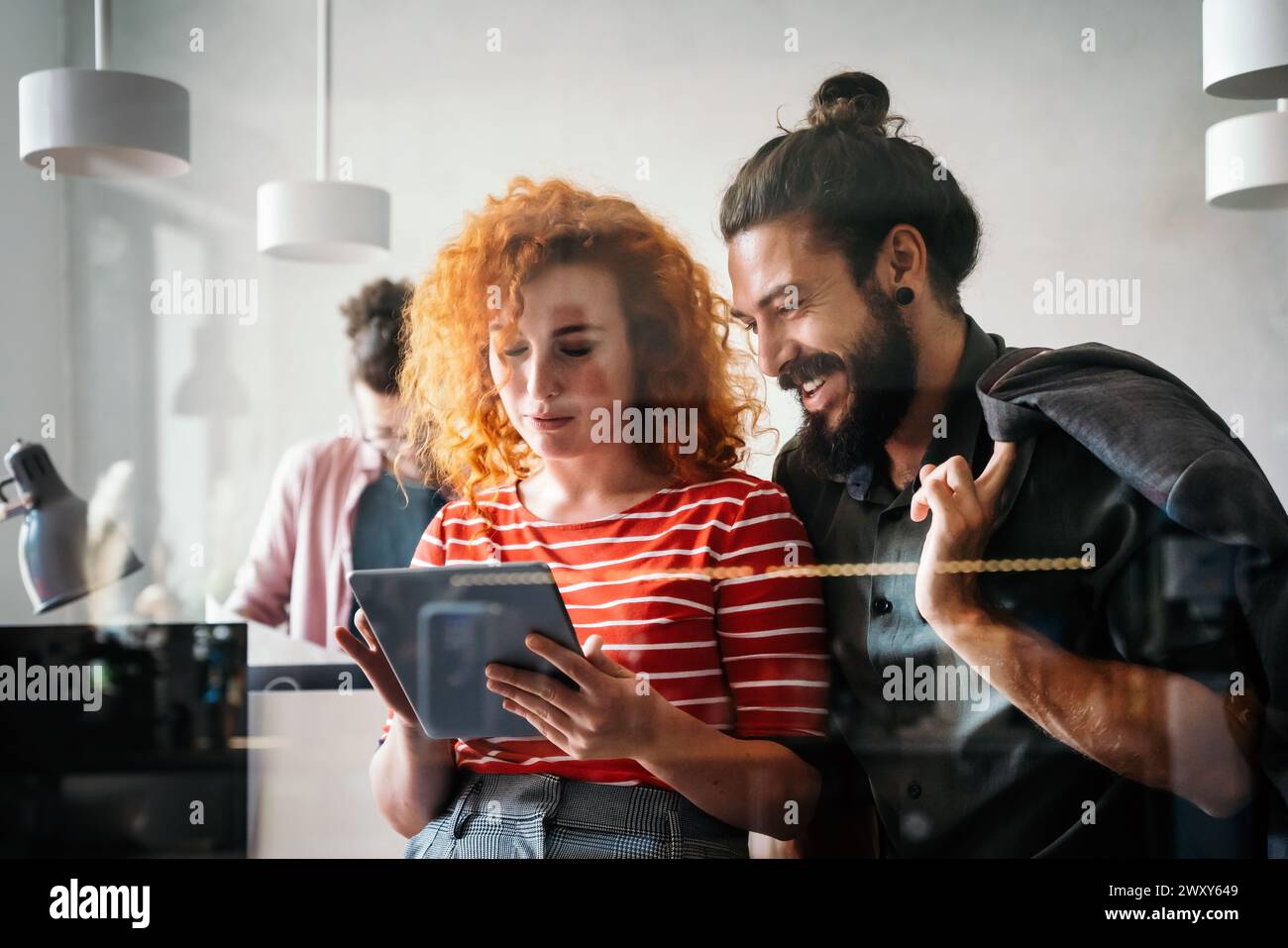 Software, coding and business woman on tablet thinking of data analytics, digital technology. Stock Photo