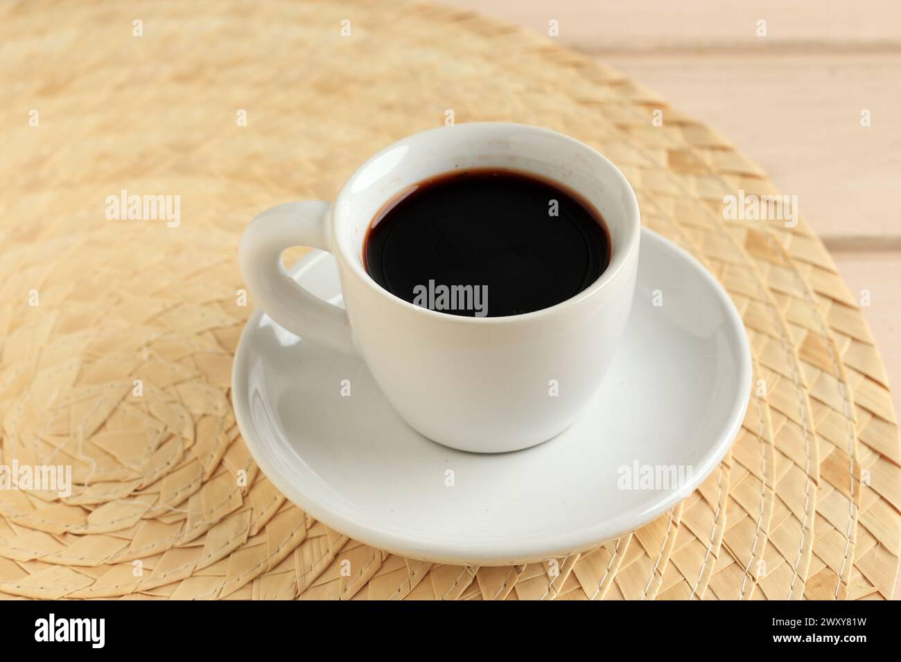 A Cup of Black Coffee on Wooden Table Stock Photo
