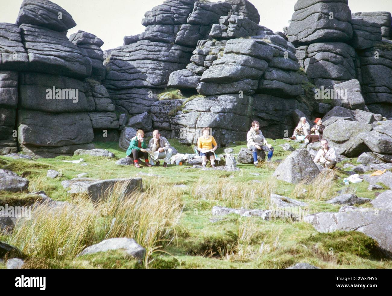 Ramblers lunch break at Yes Tor, Dartmoor national park, Devon, England, UK 1972 Stock Photo