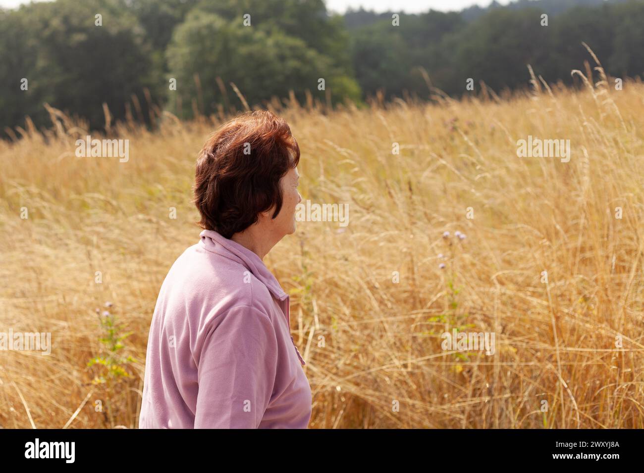 Mature woman elegant standing hi-res stock photography and images - Alamy