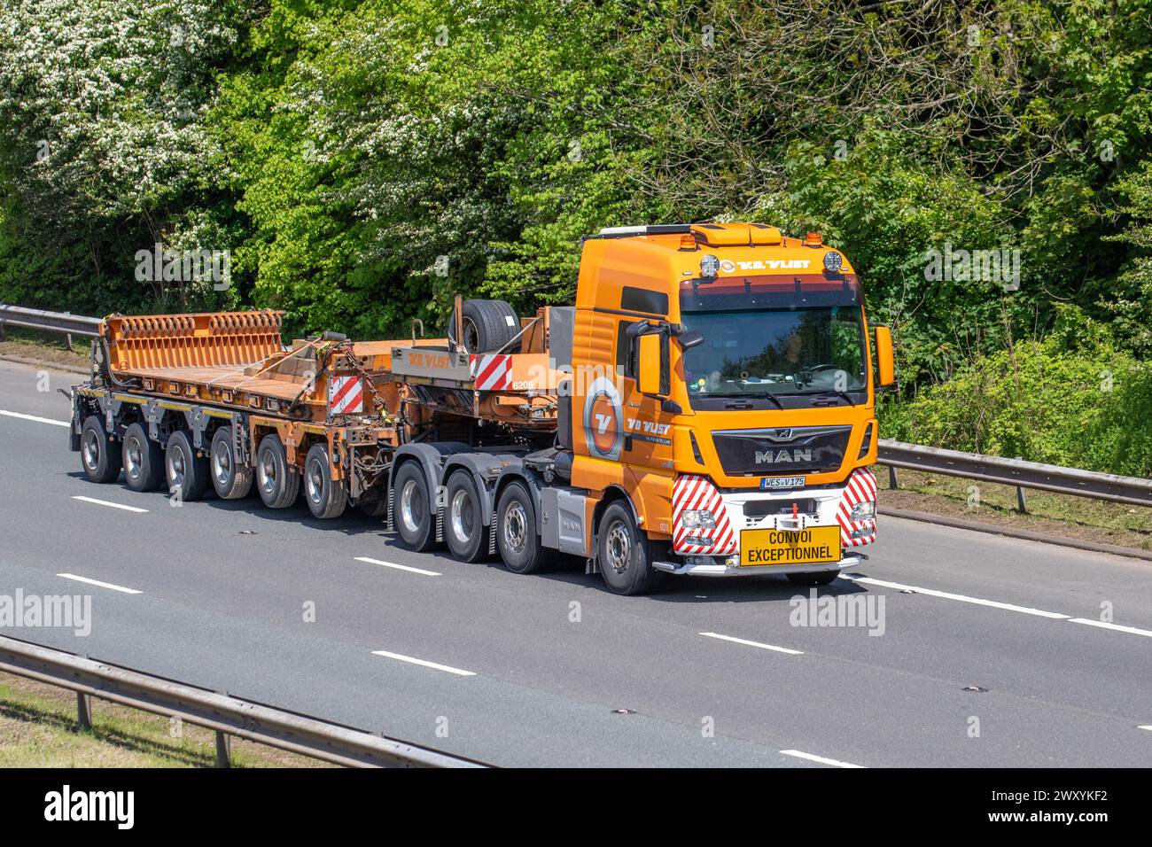 Van der Vlist UK Ltd. NetherlandsTransport Company.; provider of integrated specialist heavy lift logistics solutions special & heavy transport low-bed trailers travelling on the M6 motorway, UK Stock Photo