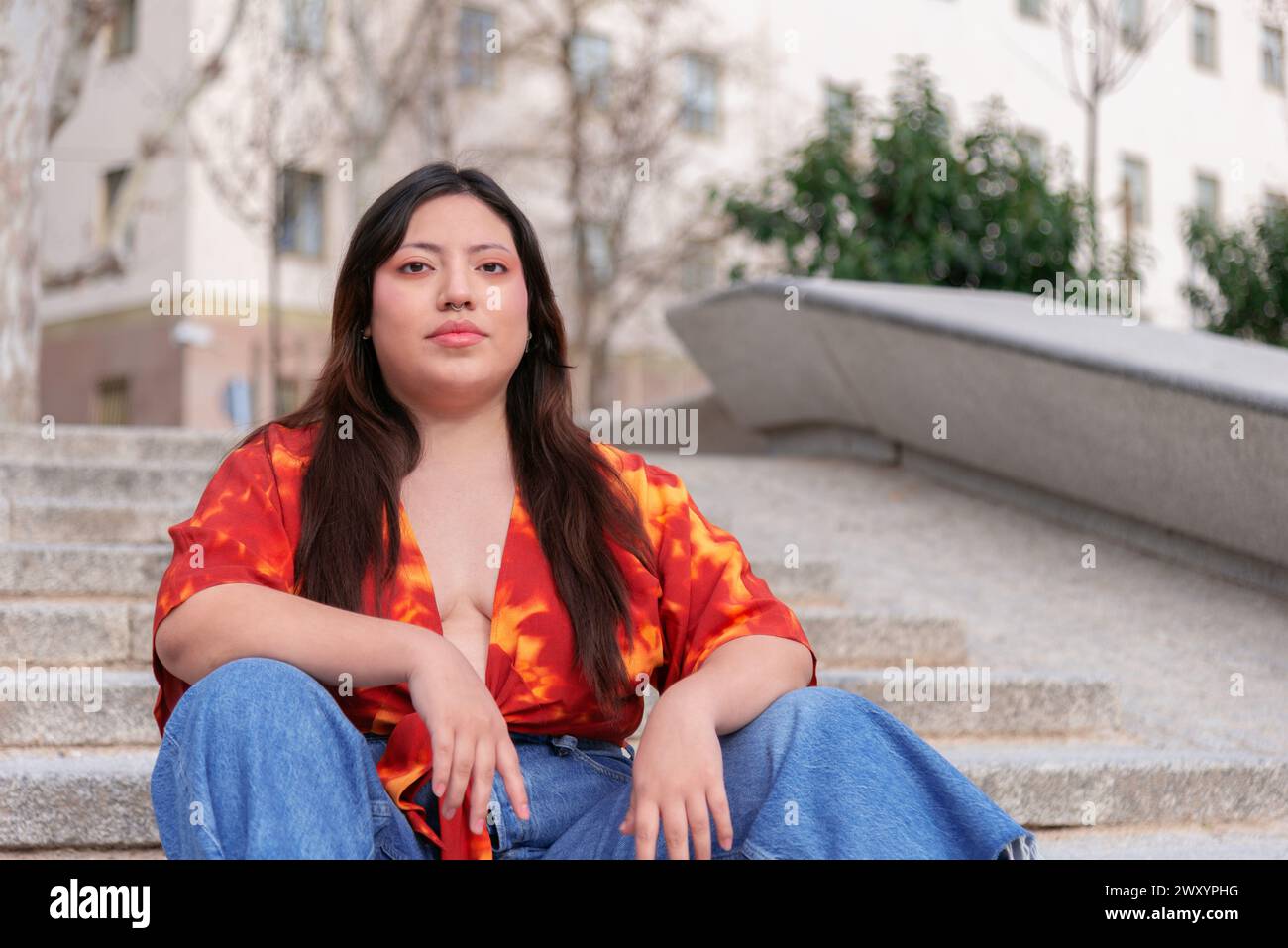 Seated young woman looking hi-res stock photography and images - Alamy