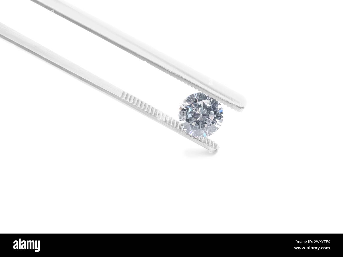 Tweezers with beautiful shiny diamond isolated on white Stock Photo - Alamy
