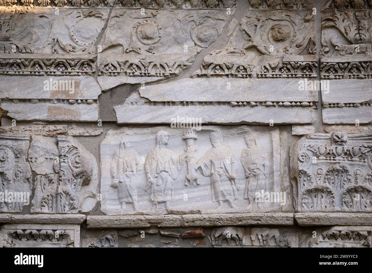 Rome. Italy. The Arcus Argentariorum (Arch of the Money-Changers / Arco degli Argentari, 204 AD). Detail shows four sacrificial attendants with an inc Stock Photo