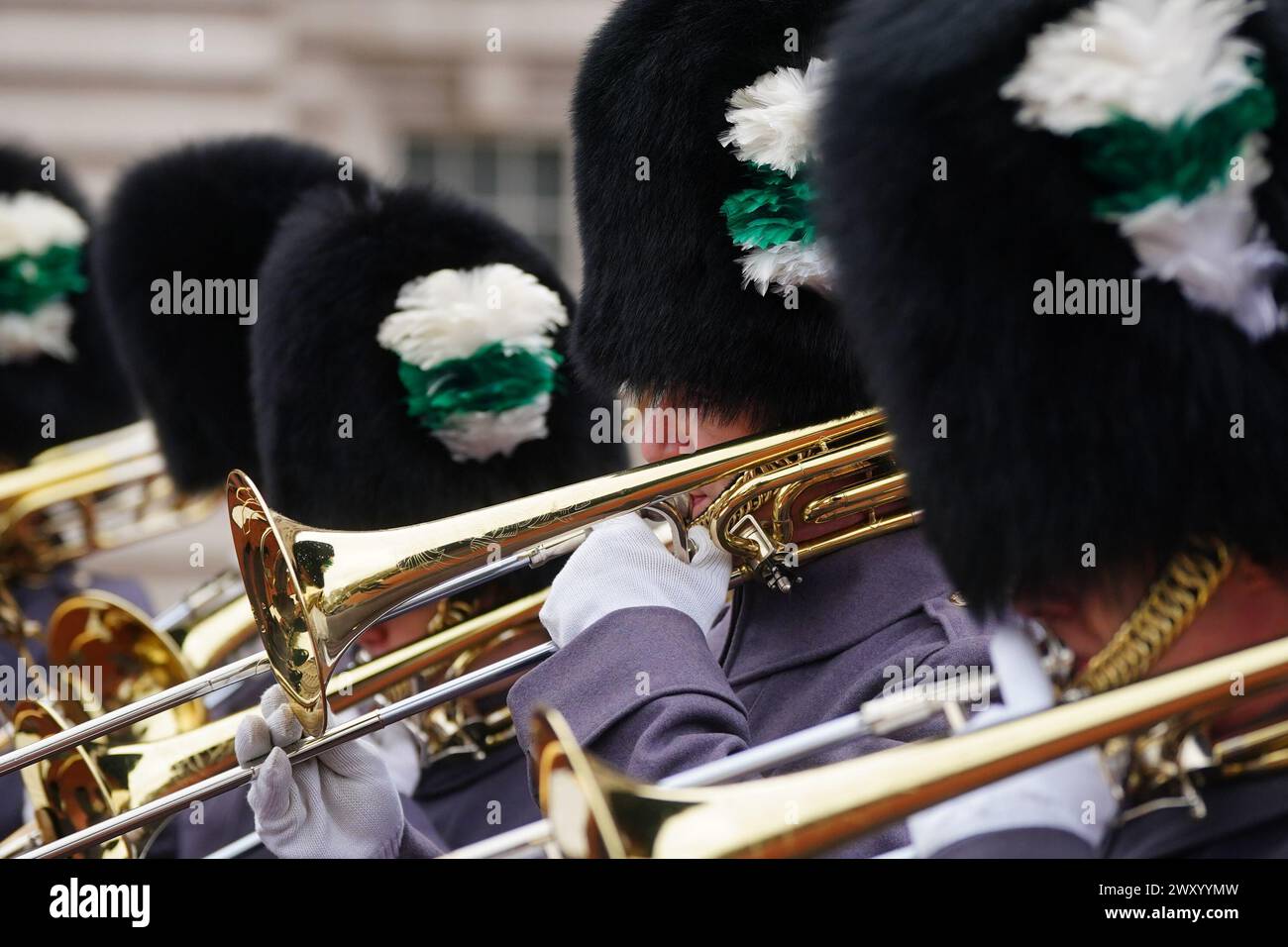 The Band of the Welsh Guards perform the NATO hymn during the Changing of the Guard ceremony at Buckingham Palace, London, to celebrate the 75th anniversary of the North Atlantic Treaty Organisation. Picture date: Wednesday April 3, 2024. Stock Photo