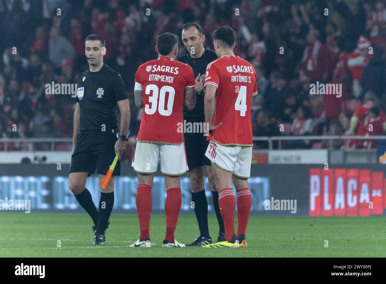 April 02, 2024. Lisbon, Portugal. Benfica's defender from Argentina Nicolas Otamendi (30), referee of the game Joao Pinheiro and Benfica's defender from Portugal Antonio Silva (4) in action during the 2nd Leg of the Semi Finals of the Portuguese Cup: Benfica vs Sporting Credit: Alexandre de Sousa/Alamy Live News Stock Photo
