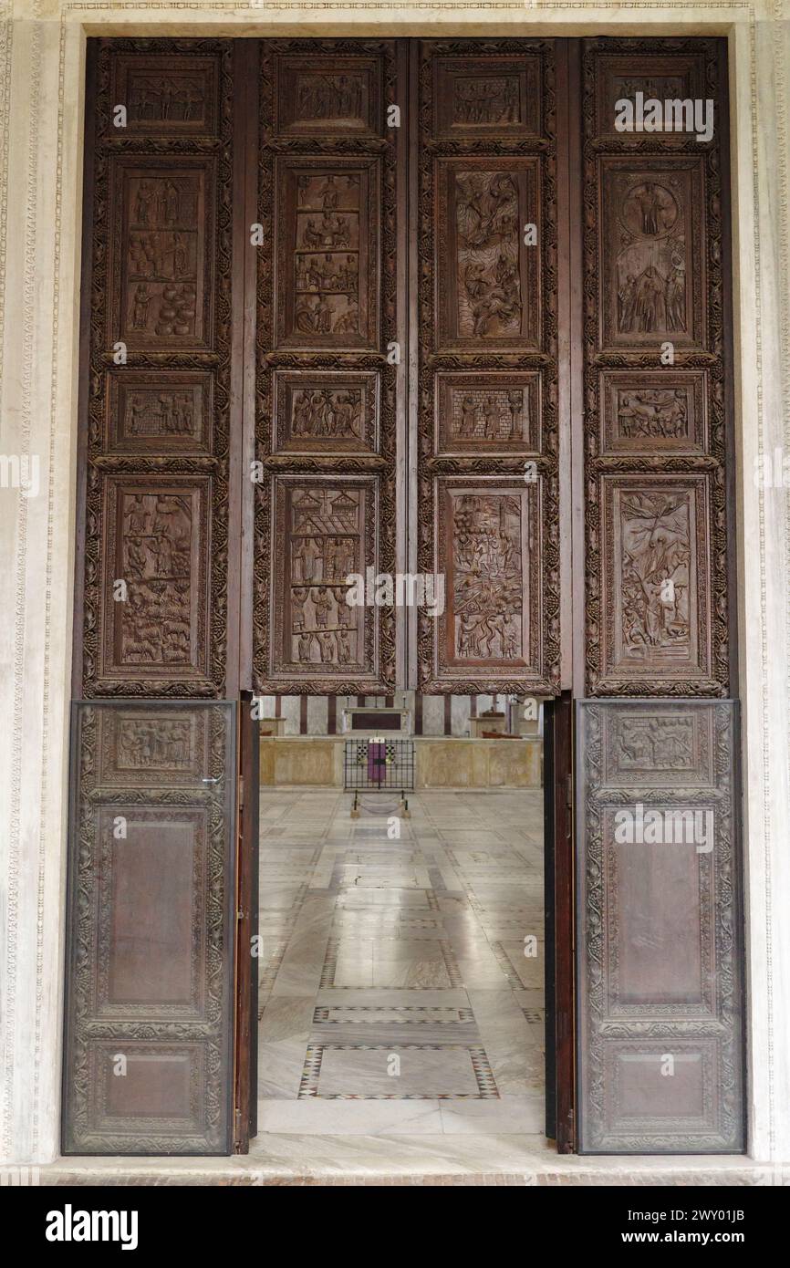 Rome. Italy. Basilica of Santa Sabina on the Aventine (Basilica di Santa Sabina all’Aventino). The cypress wood doors may date to the early 5th centur Stock Photo