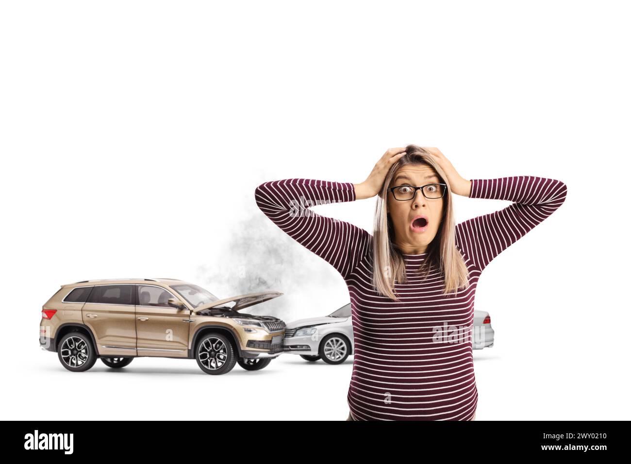 Shocked woman with glasses holding head in front of car collision isolated on white background Stock Photo