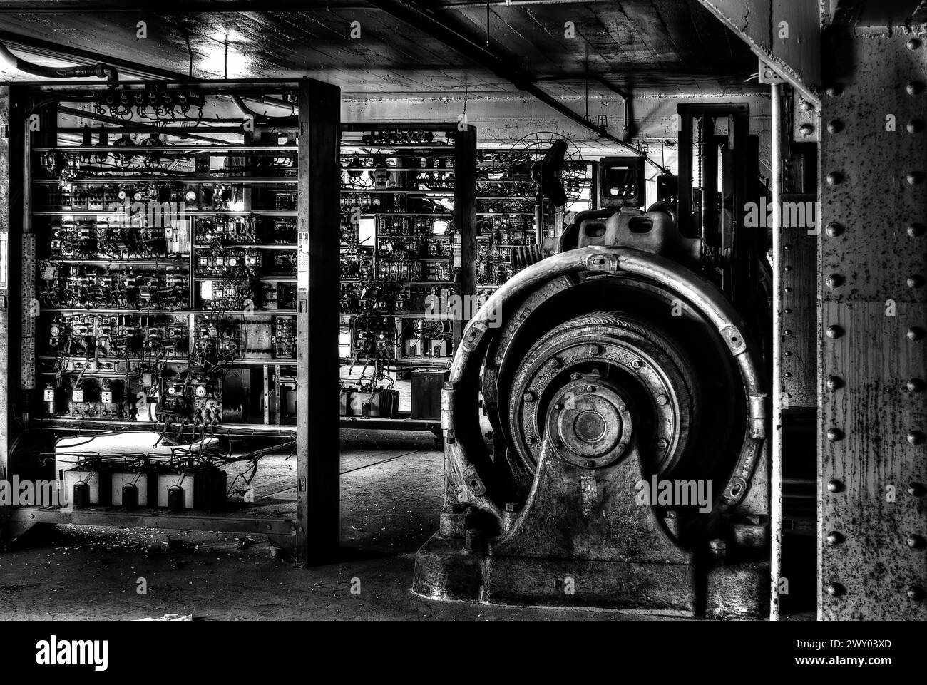 A Black and white HDR image of an old elevator room Stock Photo