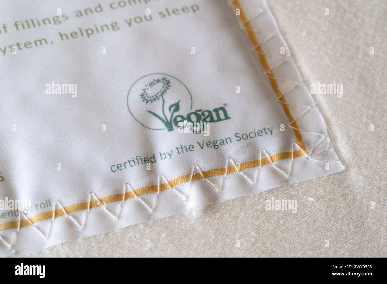 Get Laid Beds pocket spring mattress with a label certifying it as vegan by the UK Vegan Society. Concept: veganism, vegan products, vegan product Stock Photo