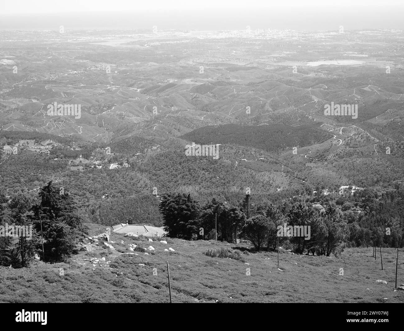 Landscape from Foia to the city of Portimao and the sea. The highest mountain in the Algarve with views of mountains and valleys down to the sea. Stock Photo