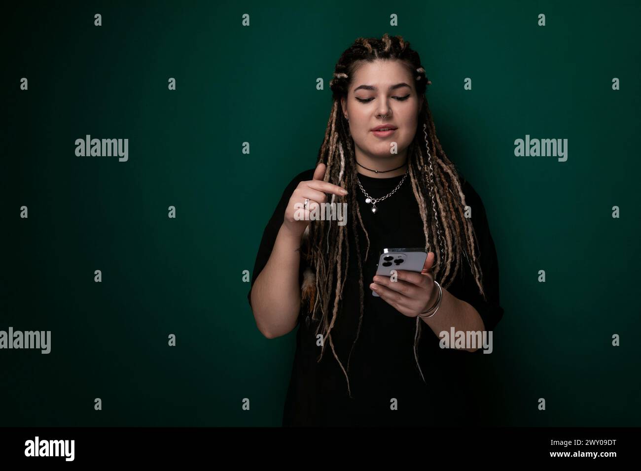 Focused black woman dreadlocks hi-res stock photography and images - Alamy