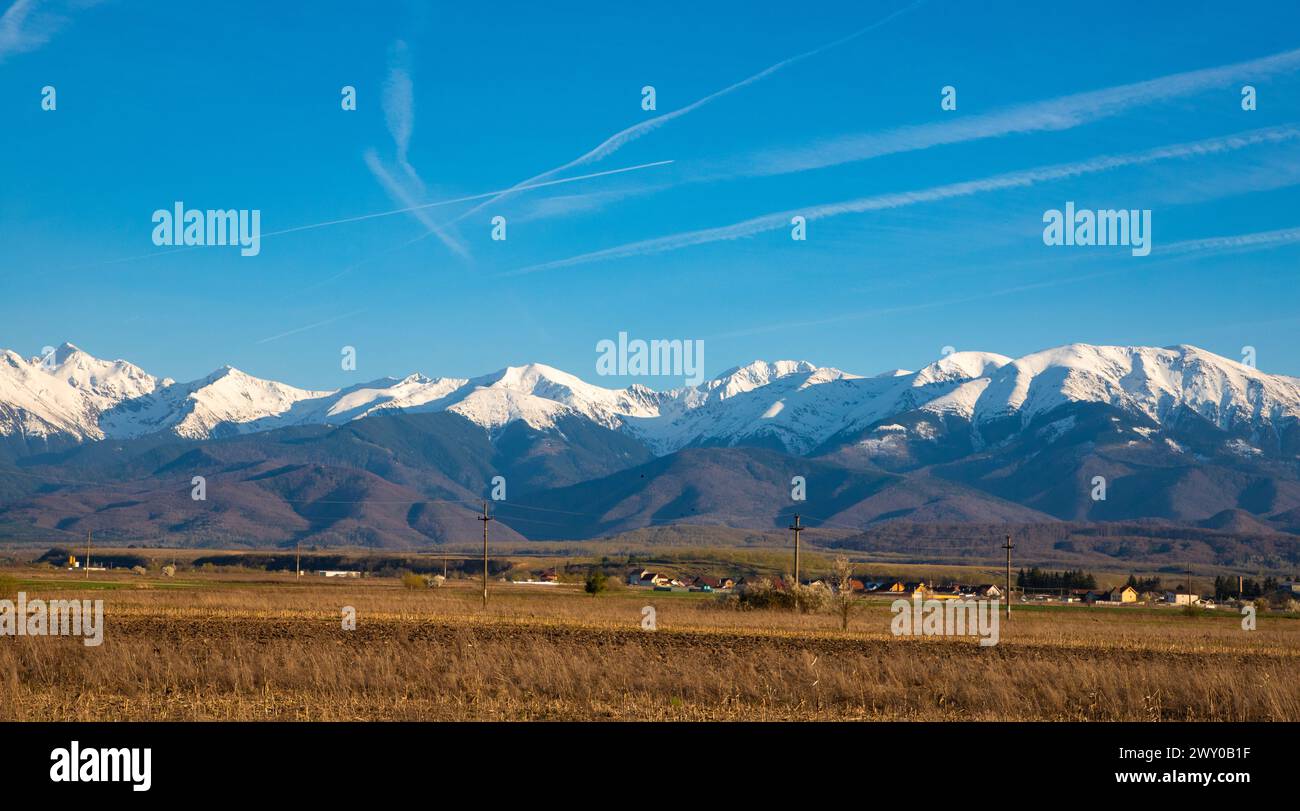 The Fagaras Mountains in Romania with their snow-covered peaks Stock Photo
