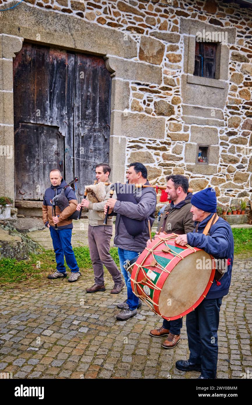 The musicians, with bagpipes and drums, play during the Winter Solstice