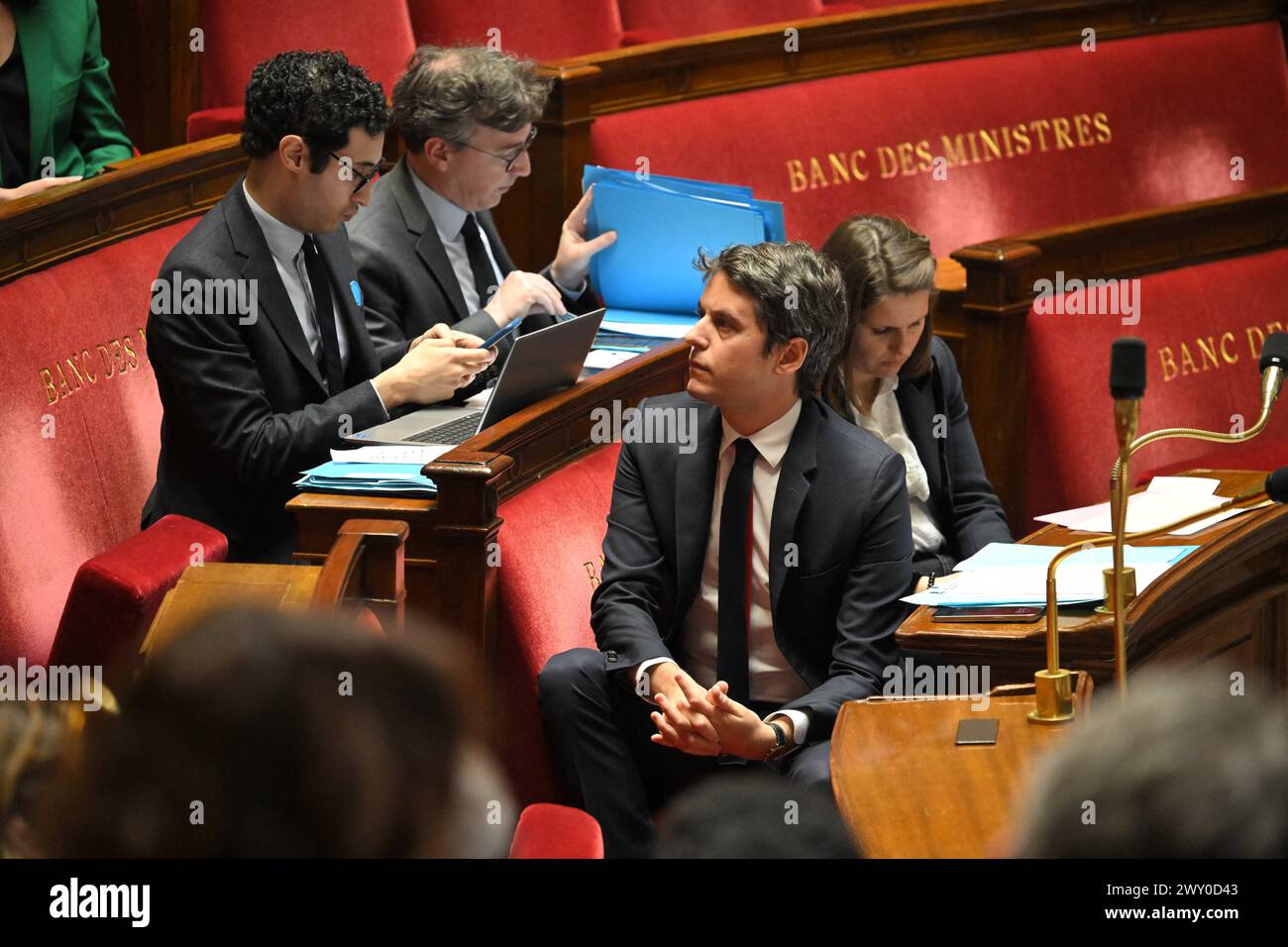 French Prime Minister Gabriel Attal speaks during a session of questions to the government at The National Assembly in Paris, France on April 3, 2024. For the first time, the National Assembly will be experimenting with a new form of government question time (QAG). The Prime Minister, Gabriel Attal, will be on his own for 45 minutes to answer questions from Members of Parliament. Yaël Braun-Pivet, the President of the Assembly, has proposed this new face-to-face format in order to revitalise this short Wednesday session, which is very often deserted compared to the traditional Tuesday session Stock Photo
