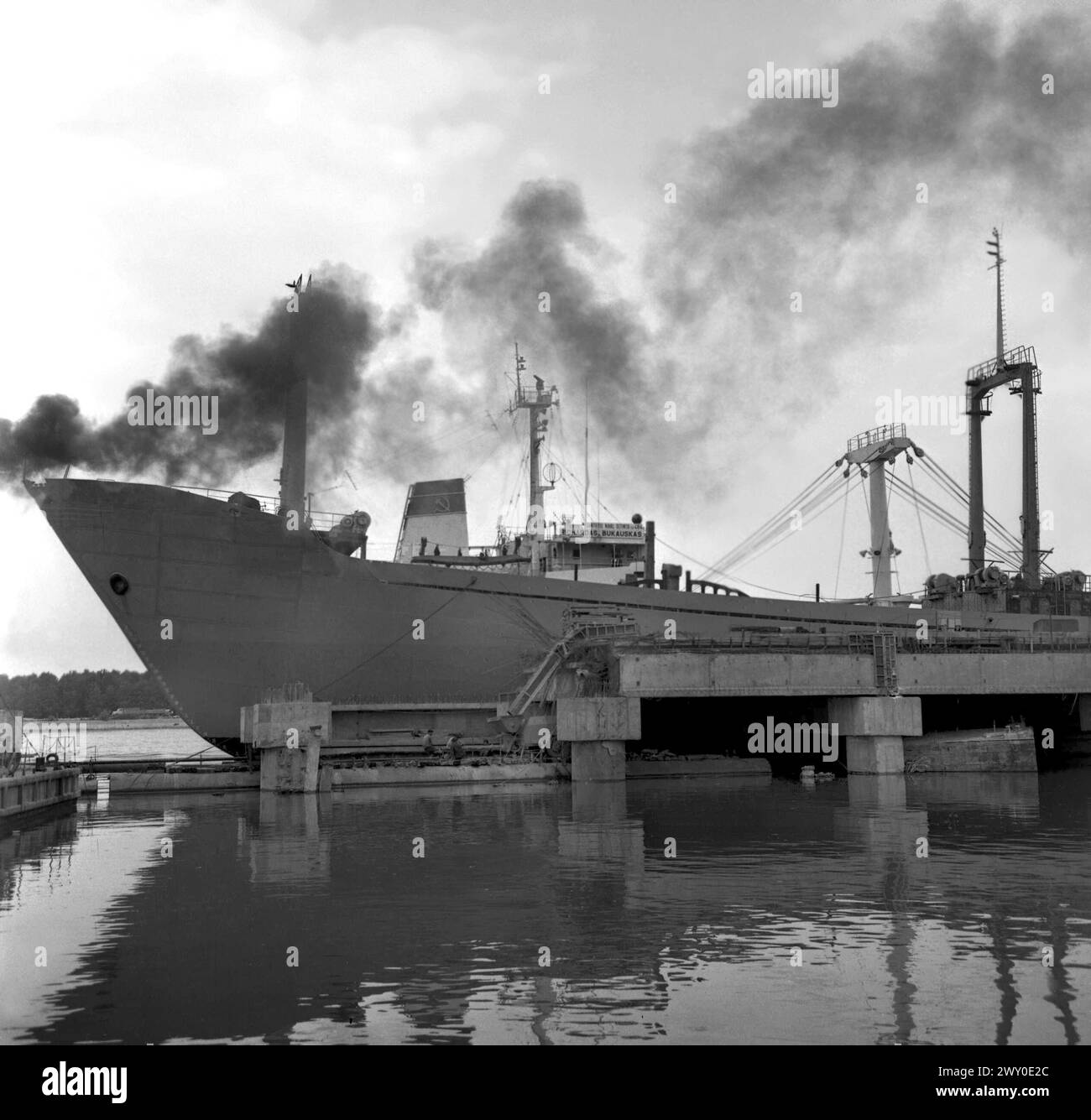 Large ship in a port in the Socialist Republic of Romania in the 1970s Stock Photo