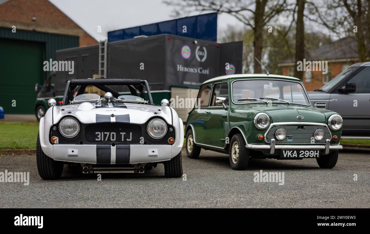 1963 Triumph TR4 & 1970 Austin Mini Cooper S, on display at the Motorsport assembly held at the Bicester Heritage Centre on the 31st March 2024. Stock Photo