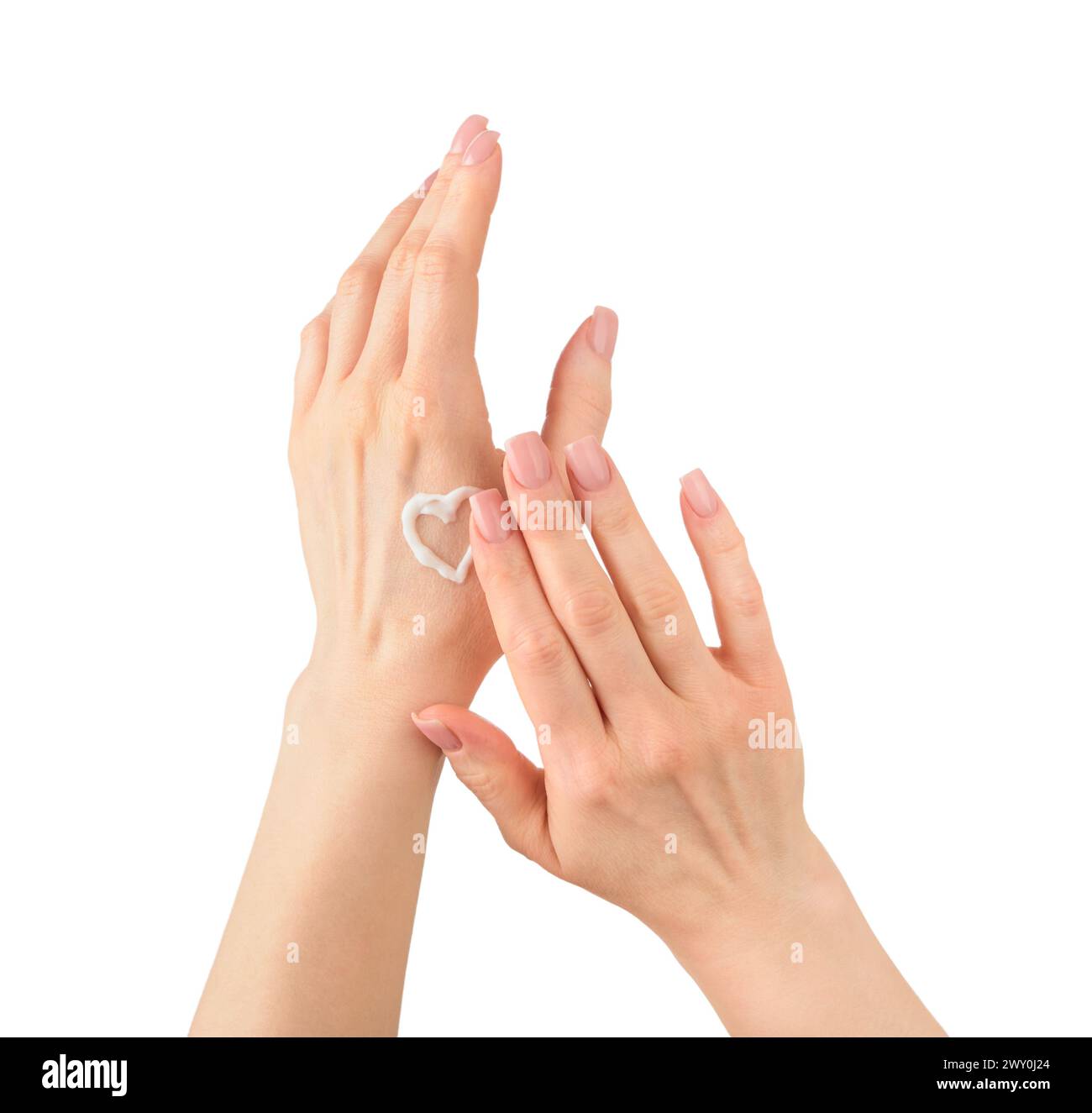 Female hands with f manicure on isolated on white background with clipping path moisturizing with cream on hand. Beauty care procedures, pampering rou Stock Photo