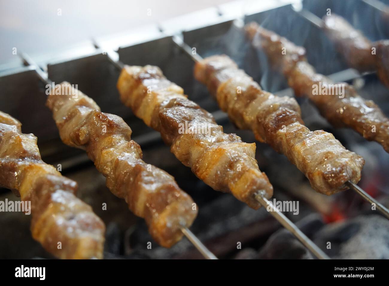 Grilling lamb skewers over charcoal Stock Photo Alamy