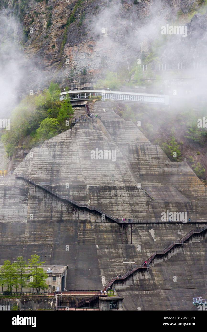 Metal steps leading vertically up the wall of a huge hydrolectric dam ...