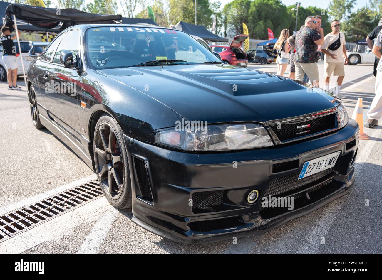 Front view of a black ninth-generation Nissan Skyline GT R33 GTS25t at a Japanese sports car meet. Stock Photo