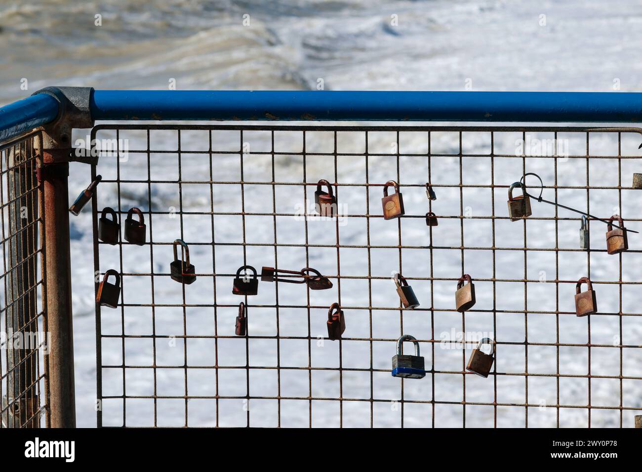 Blue railings above wire fencing hi-res stock photography and images ...