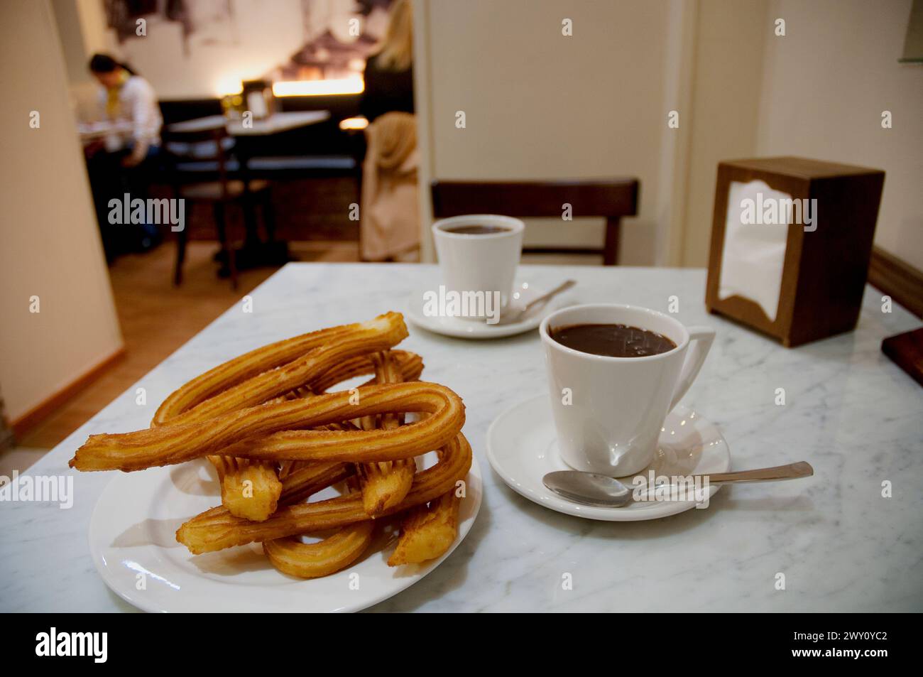 Chocolate with churros for two. Madrid, Spain. Stock Photo