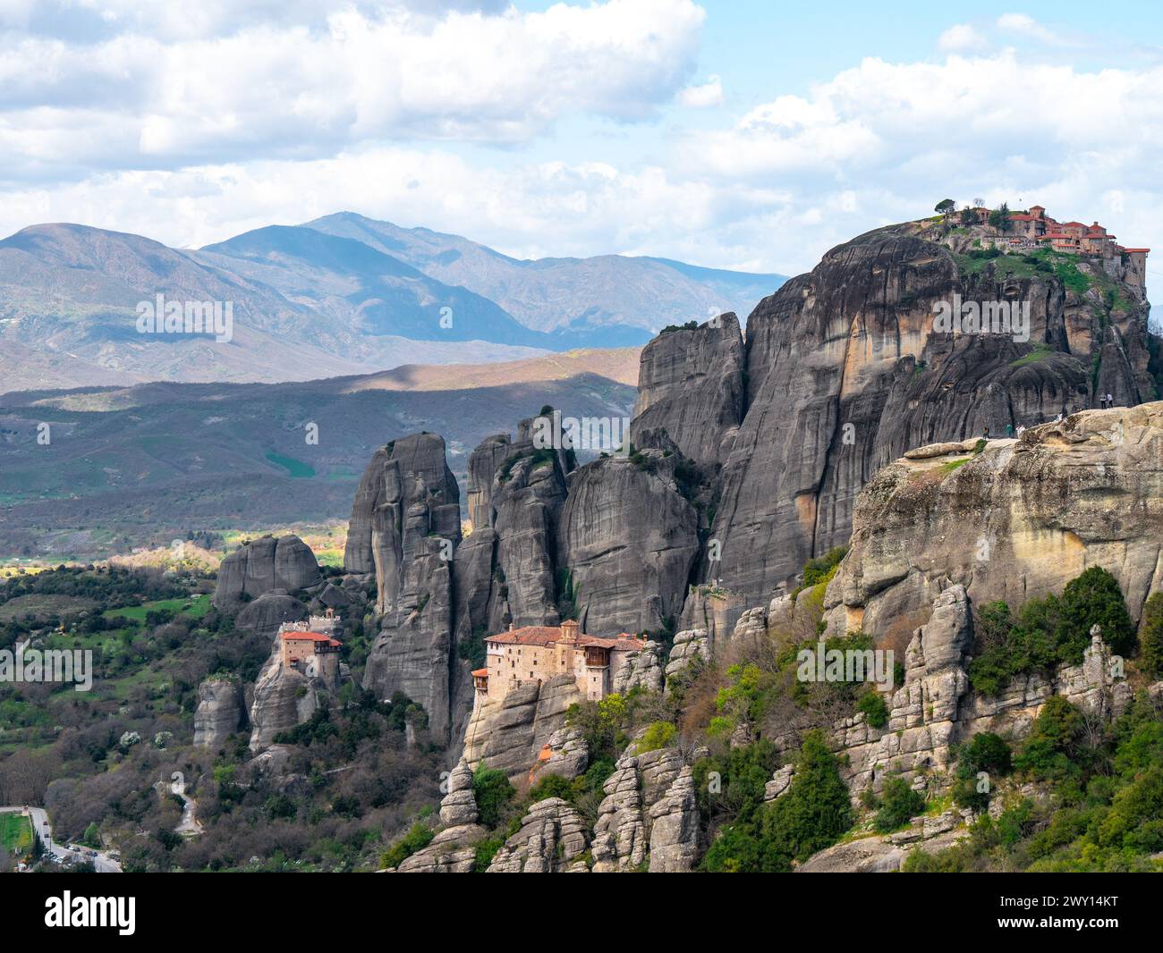 Meteora Monasteries and the surrounding rock formations on a partly ...