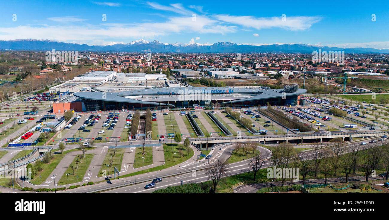 Aerial view of Carrefour shopping center of Limbiate. Shopping pole, famous brands. Limbiate, Monza and Brianza. 02-04-2024. Italy Stock Photo