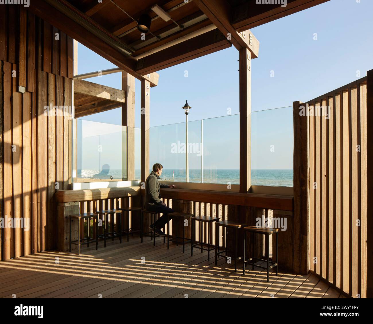 Interior view with sea view. Durley Chine Environmental Hub, Bournemouth, United Kingdom. Architect: Footprint Architects , 2023. Stock Photo
