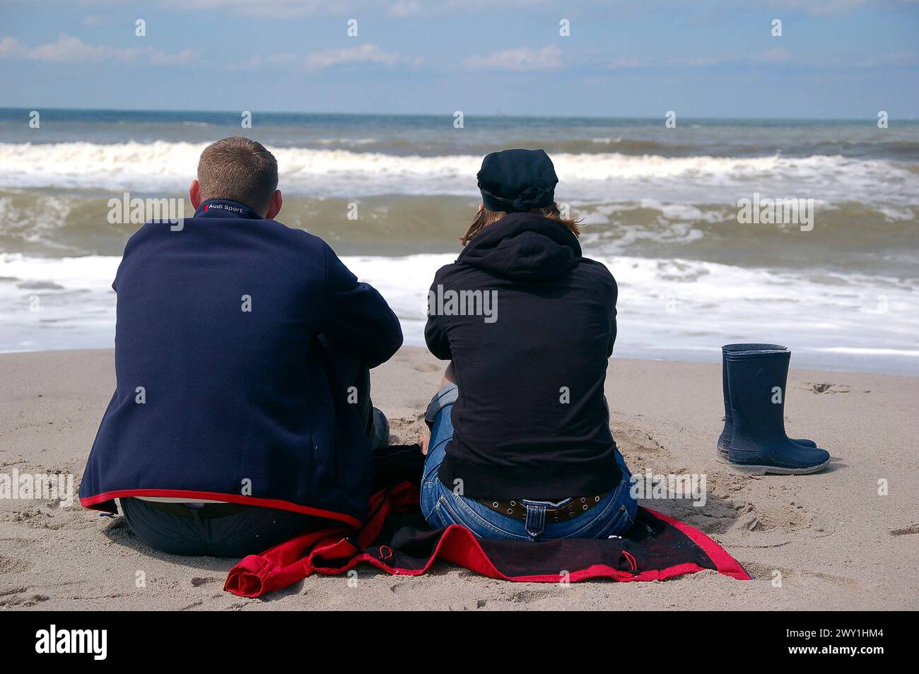 Couple Enjoying the Beach A young couple in love enjoying the NorthSea